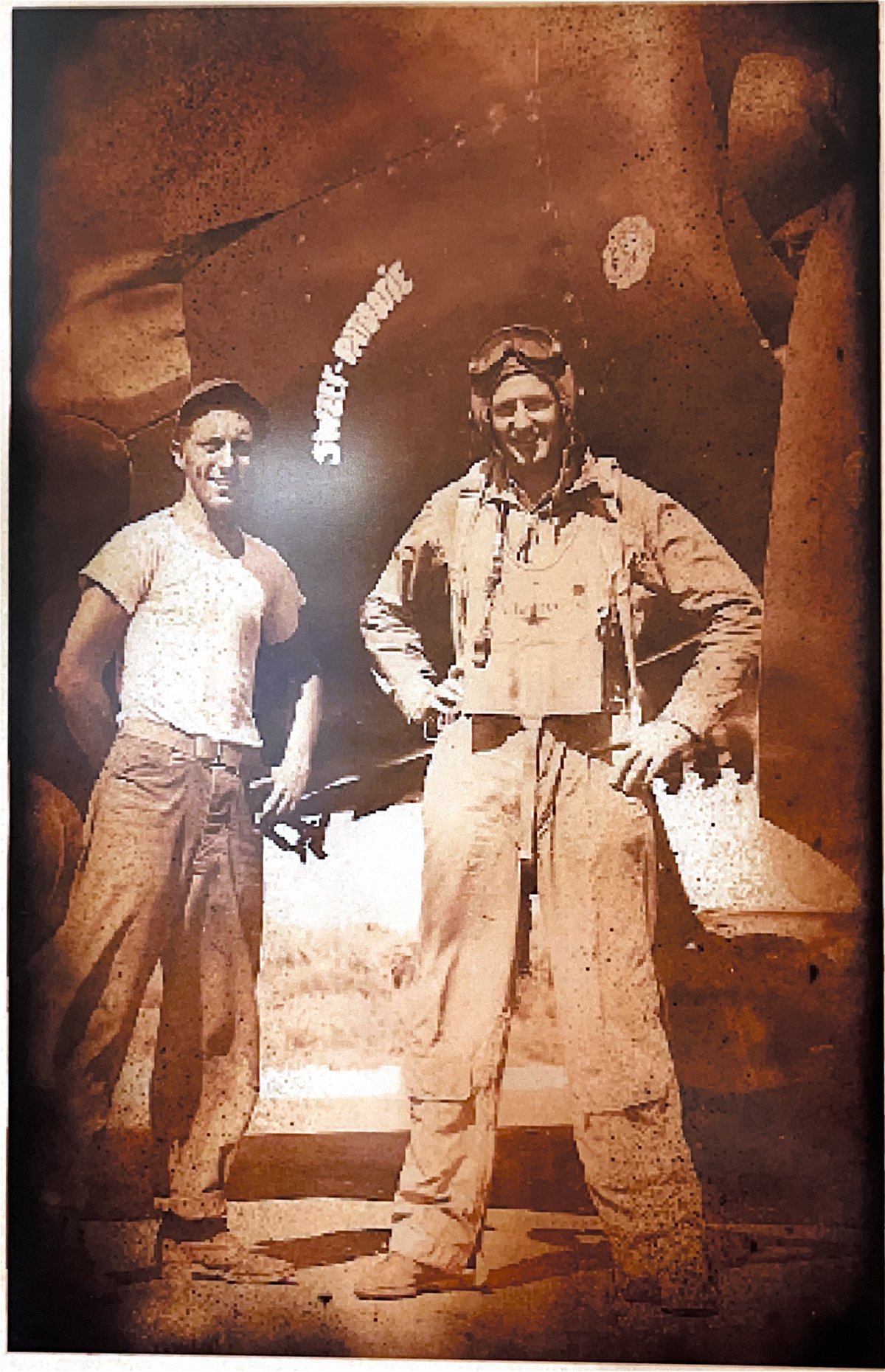 Bill Brooks with crew chief in front of an F2A-3 Buffalo marked Sweet Rosie